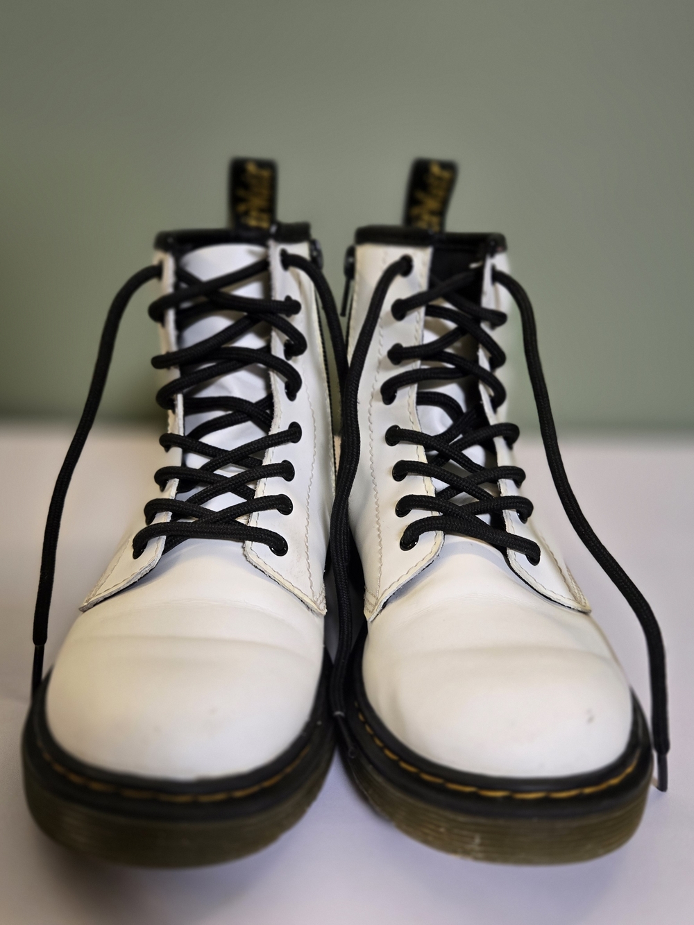Dr. Martens White Leather Combat Boots with Black Laces